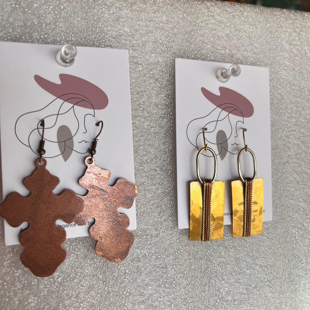 Earrings… crosses are bronze metal… the gold are hammered metal as well.